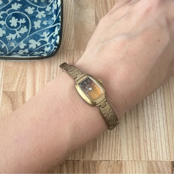 Vintage Jules Jurgensen ladies gold tone bronze tone mechanical dress watch main image 14